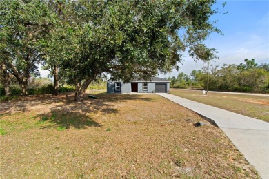 Welcome to your New Home! This stunning 5-bedroom, 2-bath home on Indian Lake Estates Golf and Country Club in Florida - for sale on GolfHomes.com, golf home, golf lot
