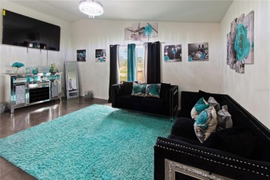 Welcome to your New Home! This stunning 5-bedroom, 2-bath home on Indian Lake Estates Golf and Country Club in Florida - for sale on GolfHomes.com, golf home, golf lot