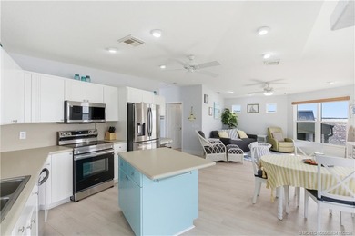 Waterfront living at its best! This fully furnished 2BD on Island Dunes Country Club in Florida - for sale on GolfHomes.com, golf home, golf lot