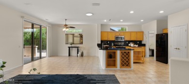Coveted 3-car garage in The Grand! This open floor plan offers on Granite Falls Golf Club  in Arizona - for sale on GolfHomes.com, golf home, golf lot