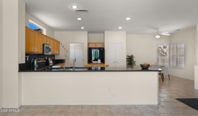 Coveted 3-car garage in The Grand! This open floor plan offers on Granite Falls Golf Club  in Arizona - for sale on GolfHomes.com, golf home, golf lot