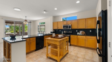 Coveted 3-car garage in The Grand! This open floor plan offers on Granite Falls Golf Club  in Arizona - for sale on GolfHomes.com, golf home, golf lot