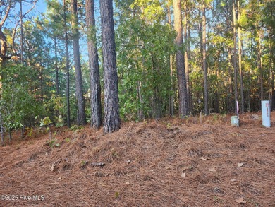 Don't miss this rare opportunity to own a 1.19-acre wooded lot on Foxfire Golf and Country Club in North Carolina - for sale on GolfHomes.com, golf home, golf lot