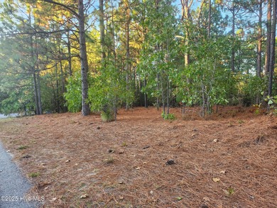 Don't miss this rare opportunity to own a 1.19-acre wooded lot on Foxfire Golf and Country Club in North Carolina - for sale on GolfHomes.com, golf home, golf lot