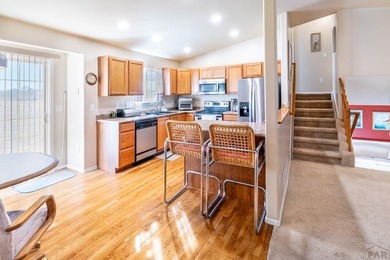 Move In ready classy home! Gracious floor plan and separates the on Desert Hawk At Pueblo West in Colorado - for sale on GolfHomes.com, golf home, golf lot