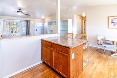 Move In ready classy home! Gracious floor plan and separates the on Desert Hawk At Pueblo West in Colorado - for sale on GolfHomes.com, golf home, golf lot