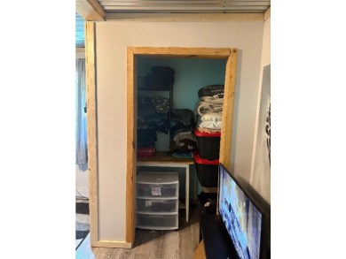 Welcome to this charming 2-bedroom, 1-bath getaway, perfectly on The Loon Golf Resort in Michigan - for sale on GolfHomes.com, golf home, golf lot