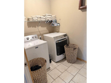 Welcome to this charming 2-bedroom, 1-bath getaway, perfectly on The Loon Golf Resort in Michigan - for sale on GolfHomes.com, golf home, golf lot