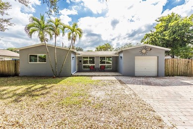 Live your best South Florida life in this charming 3/2 pool home on Cooper Colony Country Club in Florida - for sale on GolfHomes.com, golf home, golf lot