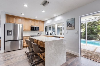 Live your best South Florida life in this charming 3/2 pool home on Cooper Colony Country Club in Florida - for sale on GolfHomes.com, golf home, golf lot