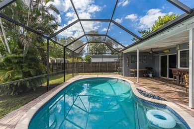 Live your best South Florida life in this charming 3/2 pool home on Cooper Colony Country Club in Florida - for sale on GolfHomes.com, golf home, golf lot