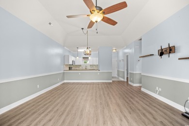 Located on the top floor of a two-story building, this well-kept on Myrtlewood Golf Course and Club  in South Carolina - for sale on GolfHomes.com, golf home, golf lot