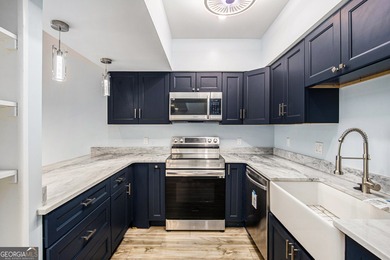 Welcome home to this charming end-unit townhome in the on Fairfield Plantation Golf and Country Club in Georgia - for sale on GolfHomes.com, golf home, golf lot