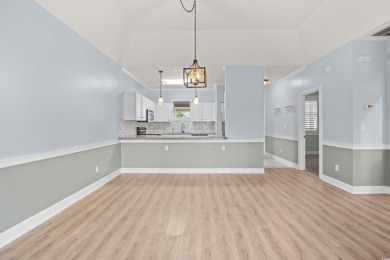 Located on the top floor of a two-story building, this well-kept on Myrtlewood Golf Course and Club  in South Carolina - for sale on GolfHomes.com, golf home, golf lot
