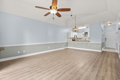 Located on the top floor of a two-story building, this well-kept on Myrtlewood Golf Course and Club  in South Carolina - for sale on GolfHomes.com, golf home, golf lot