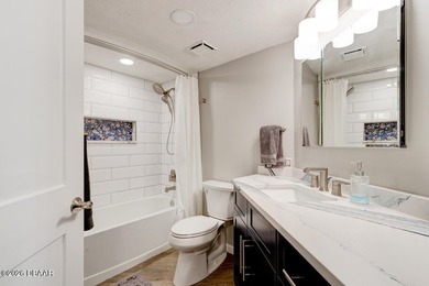 Fully renovated in 2024, this stunning 2-bedroom, 2-bath on Oceans Golf Club in Florida - for sale on GolfHomes.com, golf home, golf lot