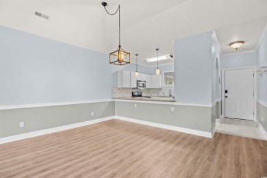 Located on the top floor of a two-story building, this well-kept on Myrtlewood Golf Course and Club  in South Carolina - for sale on GolfHomes.com, golf home, golf lot
