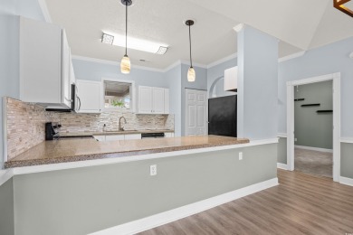 Located on the top floor of a two-story building, this well-kept on Myrtlewood Golf Course and Club  in South Carolina - for sale on GolfHomes.com, golf home, golf lot