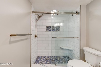 Fully renovated in 2024, this stunning 2-bedroom, 2-bath on Oceans Golf Club in Florida - for sale on GolfHomes.com, golf home, golf lot