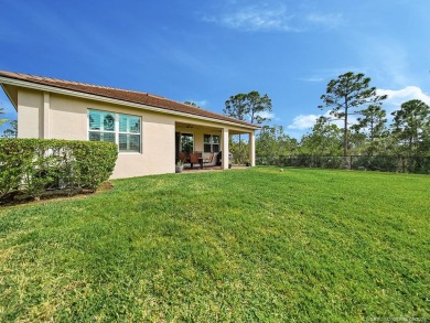 Experience effortless living as you arrive at this home nestled on Eagle Marsh Golf Club in Florida - for sale on GolfHomes.com, golf home, golf lot
