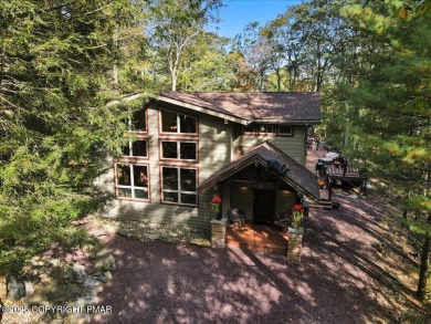 ''WHERE FOREST WHISPERS MEET MOUNTAIN MAGIC'' Tucked beneath a on Split Rock Resort and Country Club in Pennsylvania - for sale on GolfHomes.com, golf home, golf lot