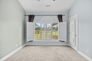 Located on the top floor of a two-story building, this well-kept on Myrtlewood Golf Course and Club  in South Carolina - for sale on GolfHomes.com, golf home, golf lot