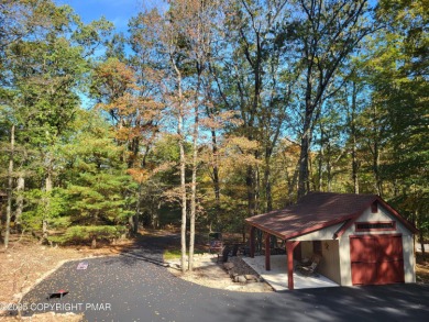 ''WHERE FOREST WHISPERS MEET MOUNTAIN MAGIC'' Tucked beneath a on Split Rock Resort and Country Club in Pennsylvania - for sale on GolfHomes.com, golf home, golf lot