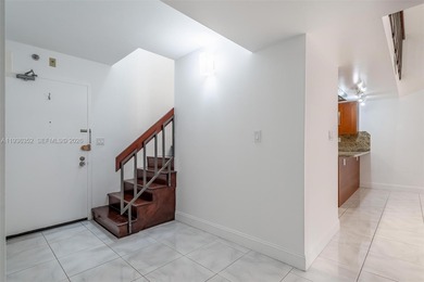 Experience the exceptional charm of this remodeled 3-bedroom on Turnberry Isle Resort and Club in Florida - for sale on GolfHomes.com, golf home, golf lot