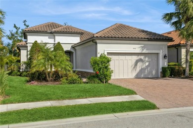 Welcome to this exquisite Taylor Morrison Farnese model home on Mission Valley Country Club in Florida - for sale on GolfHomes.com, golf home, golf lot