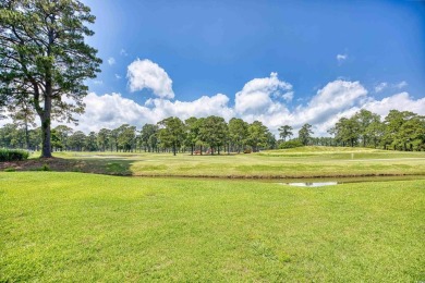 Located on the top floor of a two-story building, this well-kept on Myrtlewood Golf Course and Club  in South Carolina - for sale on GolfHomes.com, golf home, golf lot