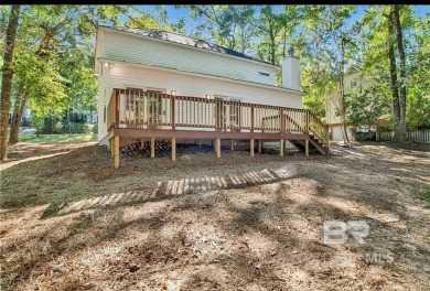 Welcome to this charming completely renovated home nestled in on Lake Forest Yacht and Country Club in Alabama - for sale on GolfHomes.com, golf home, golf lot