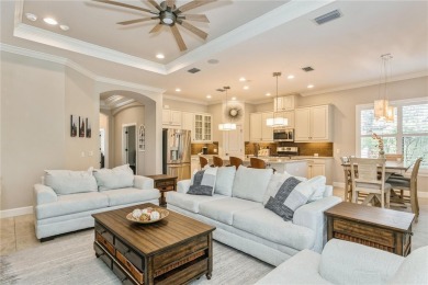 Welcome to this exquisite Taylor Morrison Farnese model home on Mission Valley Country Club in Florida - for sale on GolfHomes.com, golf home, golf lot