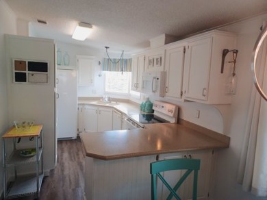 Listed by the Official Sales Team of Cypress Lakes Village on Big Cypress Golf and Country Club in Florida - for sale on GolfHomes.com, golf home, golf lot