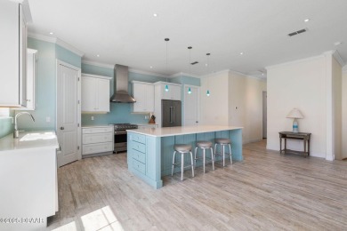 LUXURY MEETS COASTAL BEAUTY. This beautifully built 3-bedroom, 2 on The Ocean Course At Hammock Beach Resort in Florida - for sale on GolfHomes.com, golf home, golf lot