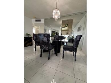 Bright and Stunning Corner unit with lake & Golf views, located on Oriole Golf and Tennis Club in Florida - for sale on GolfHomes.com, golf home, golf lot