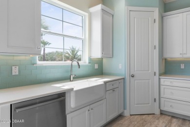 LUXURY MEETS COASTAL BEAUTY. This beautifully built 3-bedroom, 2 on The Ocean Course At Hammock Beach Resort in Florida - for sale on GolfHomes.com, golf home, golf lot