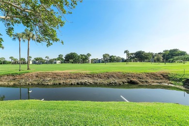 Bright and Stunning Corner unit with lake & Golf views, located on Oriole Golf and Tennis Club in Florida - for sale on GolfHomes.com, golf home, golf lot