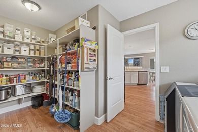 Perched against the iconic Superstition and Dinosaur Mountains on Gold Canyon Golf Resort - Sidewinder in Arizona - for sale on GolfHomes.com, golf home, golf lot