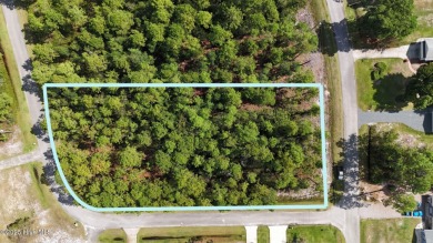 This beautiful corner lot on a paved road offers a quiet, wooded on The Lakes Country Club in North Carolina - for sale on GolfHomes.com, golf home, golf lot