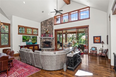 Breathtaking views of Lake Keowee's only waterfall frame this on The Cliffs At Keowee Falls in South Carolina - for sale on GolfHomes.com, golf home, golf lot