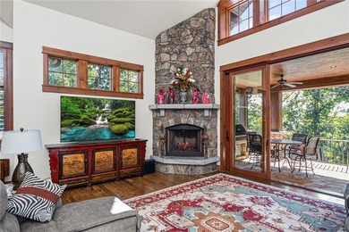 Breathtaking views of Lake Keowee's only waterfall frame this on The Cliffs At Keowee Falls in South Carolina - for sale on GolfHomes.com, golf home, golf lot