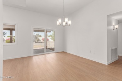 Beautifully renovated Sun City home on an oversized lot! This on PalmBrook Country Club in Arizona - for sale on GolfHomes.com, golf home, golf lot
