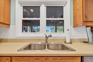 Custom designed 3 Br., 2.5 Ba. resort home is privately tucked on The Plantation Course At Edisto in South Carolina - for sale on GolfHomes.com, golf home, golf lot