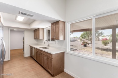 Beautifully renovated Sun City home on an oversized lot! This on PalmBrook Country Club in Arizona - for sale on GolfHomes.com, golf home, golf lot