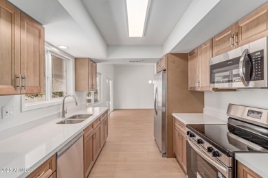 Beautifully renovated Sun City home on an oversized lot! This on PalmBrook Country Club in Arizona - for sale on GolfHomes.com, golf home, golf lot