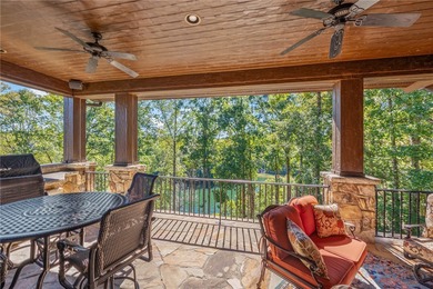 Breathtaking views of Lake Keowee's only waterfall frame this on The Cliffs At Keowee Falls in South Carolina - for sale on GolfHomes.com, golf home, golf lot