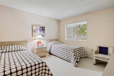 Beautifully maintained 3-bedroom townhouse in a sought-after 55+ on Fountains Golf and Country Club in Florida - for sale on GolfHomes.com, golf home, golf lot