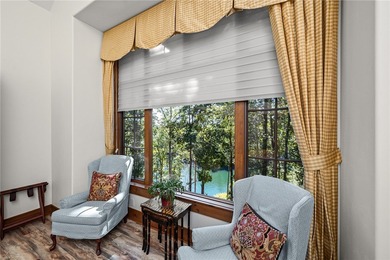 Breathtaking views of Lake Keowee's only waterfall frame this on The Cliffs At Keowee Falls in South Carolina - for sale on GolfHomes.com, golf home, golf lot