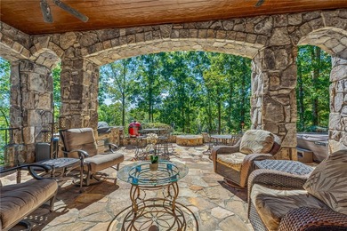 Breathtaking views of Lake Keowee's only waterfall frame this on The Cliffs At Keowee Falls in South Carolina - for sale on GolfHomes.com, golf home, golf lot