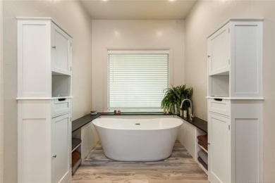 Experience lakeside living at its finest with this custom-built on The Coves Golf Course in Oklahoma - for sale on GolfHomes.com, golf home, golf lot